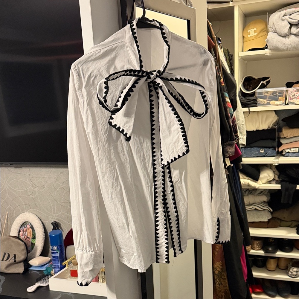 Elegant White Blouse with Black Trim